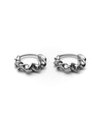 Pair of silver hoop earrings on a white background