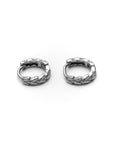 Pair of silver hoop earrings on a white background