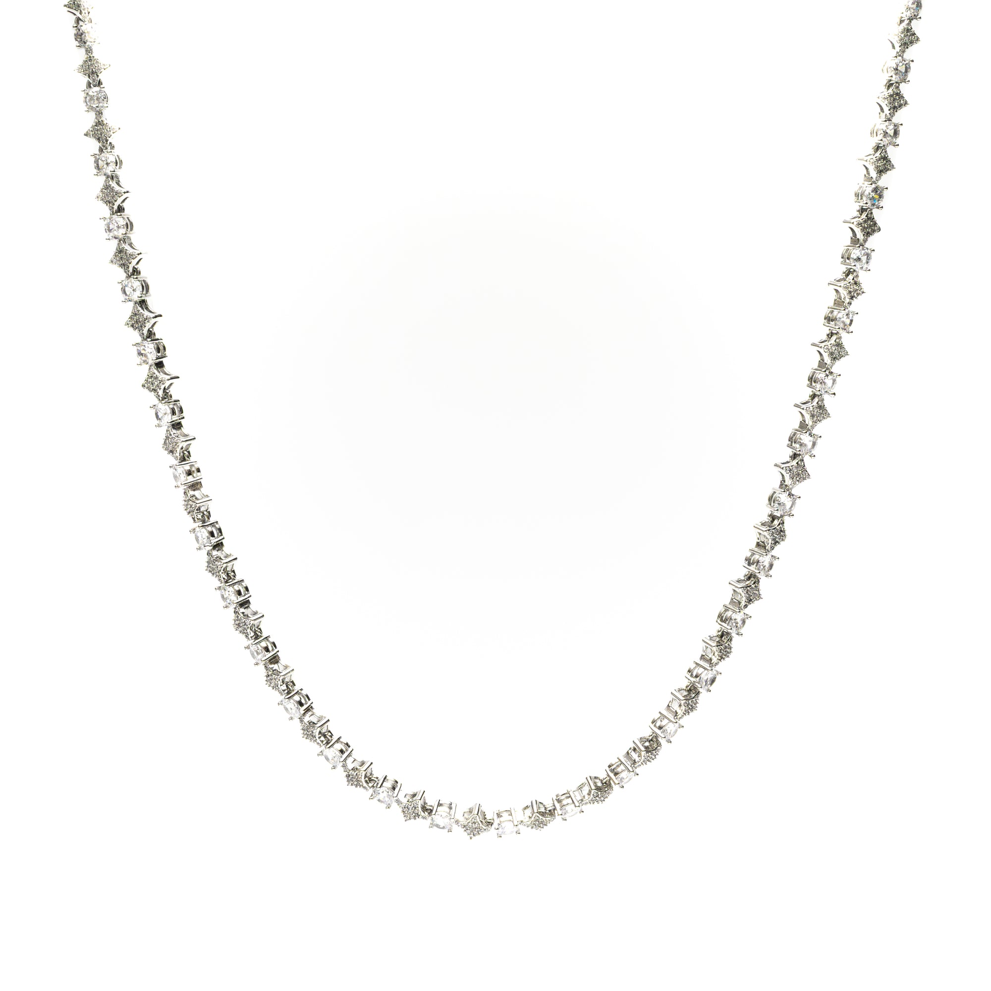 Silver necklace with small beads on a white background